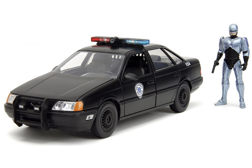 FORD TAURUS POLICE 1986 ROBOCOP (ПОЛИЦИЯ ИЗ ФИЛЬМА РОБОКОП) С ФИГУРКОЙ