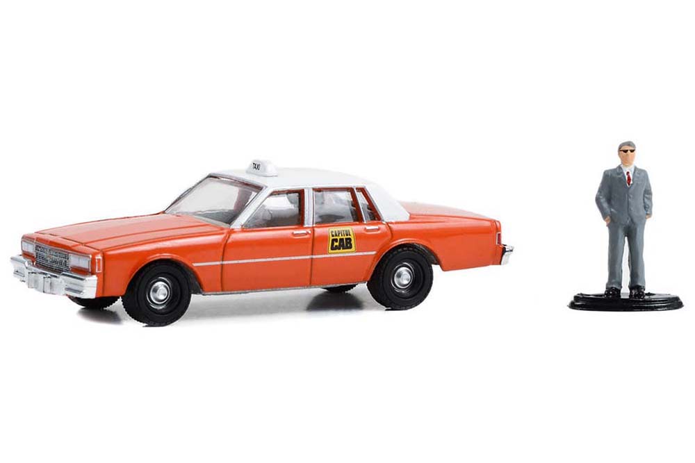 CHEVROLET IMPALA "CAPITOL CAB TAXI" С ФИГУРКОЙ МУЖЧИНЫ В КОСТЮМЕ 1981 (ДЛИНА МОДЕЛИ 6-10 СМ)