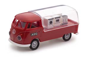 VW VOLKSWAGEN T1B PRESENTATIONWAGEN AEG 1960 КРАСНЫЙ СО СТИРАЛЬНЫМИ МАШИНАМИ (ДЛИНА МОДЕЛИ 3-5 СМ)