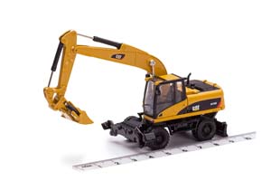 GMC CAT M3180 КОЛЕСНЫЙ ЭКСКАВАТОР (ДЛИНА МОДЕЛИ 3-5 СМ) — фото 11