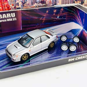 SUBARU IMPREZA WRX 2001 (ПРАВОРУЛЬНЫЙ) С ДОП.КОЛЕСАМИ, СЕРЕБРИСТЫЙ (ДЛИНА МОДЕЛИ 6-10 СМ)