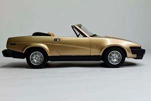 TRIUMPH TR-7 DNC GOLD BOS MODELS 1:18 — фото 9