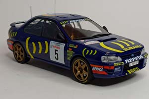 SUBARU IMREZA 555 TOUR DE CORSE 1995 IXO 1:18 — фото 7