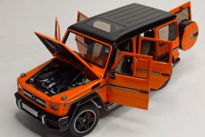 MERCEDES G63 AMG (W463) ORANGE 1:18 ALMOST REAL — фото 2