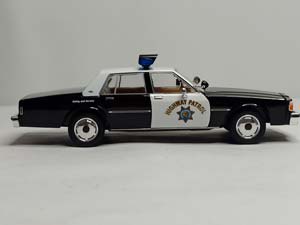 CHEVROLET CAPRICE POLICE -1989-GREENLIGHT 1:24 — фото 8