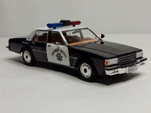 CHEVROLET CAPRICE POLICE -1989-GREENLIGHT 1:24 — фото 1