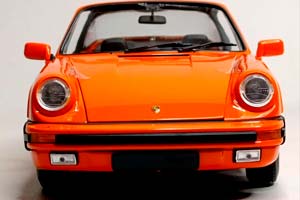 PORSCHE 911 CARRERA 3.2 TARGA -1983 ORANGE 1:18 — фото 8