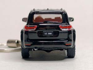 TOYOTA LAND CRUISER 300 БРЕЛОК 1:64 75ММ — фото 6